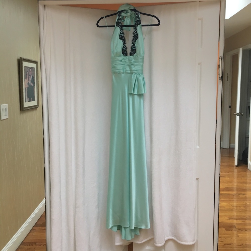 Silk halter neck gown with black lace accents